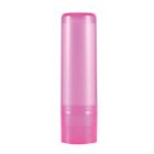 A pink, empty cylindrical lip balm container with a clear cap.