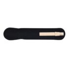Black skateboard deck with a light-colored grip tape section attached.