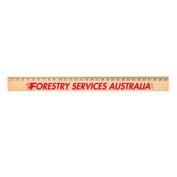 Wooden ruler with FORESTRY SERVICES AUSTRALIA and measurement markings in red.