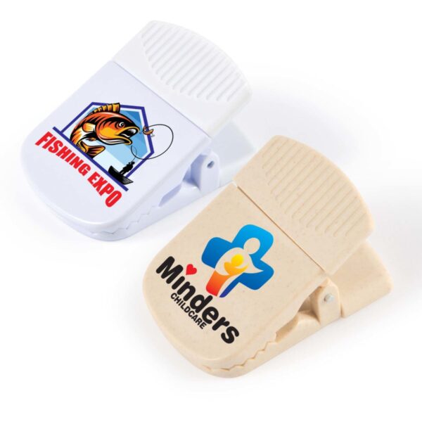 Two promotional magnetic clips, one with a fishing graphic and the other with a childcare logo.