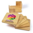 Set of six bamboo coasters with colorful logo and holder, featuring contact info and website details.