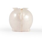 White whale-shaped sculptural object with a slit on top, resembling a piggy bank, against a plain background.