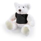 White teddy bear wearing a black shirt, sitting against a white background.