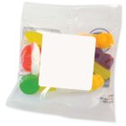 Small bag of assorted gummy candies with a blank white label on the front.