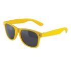 Yellow sunglasses with dark lenses on a white background.