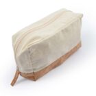 Cream and cork-colored rectangular pouch with a zipper on the top.