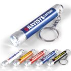 Five colored keychain flashlights with NAVISYS ELECTRONIC text, shown in blue, silver, yellow, red, and black.