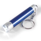 Blue cylindrical flashlight keychain with silver ends and a small chain loop.