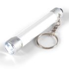 Silver keychain flashlight with a small light, cylindrical body, and a metal ring attached.