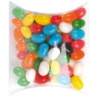 A clear, curved box holding a mix of colorful jelly beans in various colors.