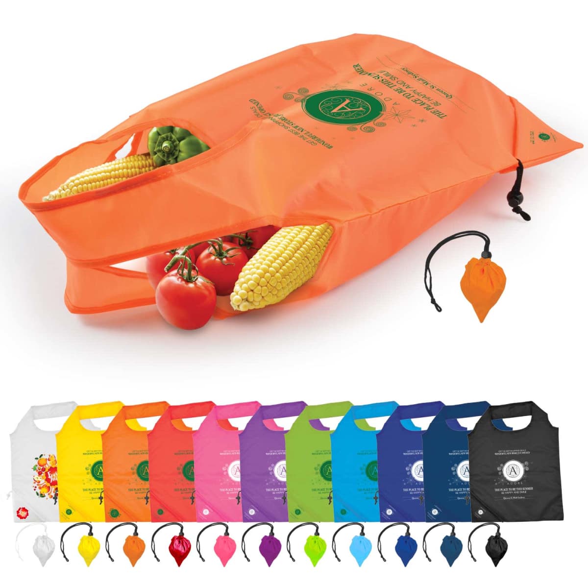 Reusable orange shopping bag with various vegetables spilling out, including corn and tomatoes. Below are more bags in different colors like white, yellow, pink, and blue, each with a small pouch attached at the bottom.