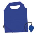 A blue reusable shopping bag with thick handles is shown. Next to it is a small matching pouch with a drawstring for storage. The bag is unfolded and laid flat, while the pouch is compact and circular.