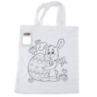 A white tote bag features a black and white illustration of a smiling bunny hugging a large Easter egg. Butterflies and flowers surround them. A set of colored crayons is placed in a pocket at the top left corner.