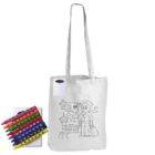 A white tote bag with a black outline drawing of a pilot, a plane, and an airport. Next to the bag is a pack of colorful crayons.