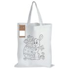 White tote bag with a coloring book panel featuring a cartoon bunny holding a large decorated Easter egg, surrounded by flowers and butterflies. The panel includes four crayons for coloring.