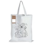 A white tote bag featuring an outlined drawing of a pirate with a parrot on his shoulder, a treasure chest, and a palm tree. The bag has a set of crayons and a coloring section attached.