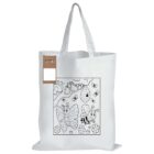 A white tote bag with an outline drawing of a butterfly and a bee under a tree with a hive. Small bees fly around, with flowers at the bottom. A cardboard packaging with crayons is attached to the handle.