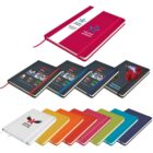 A collection of notebooks with various colorful covers including red, black, white, orange, yellow, green, blue, and turquoise. Each cover features different graphic designs or logos. A larger red notebook with a white stripe is displayed on top.
