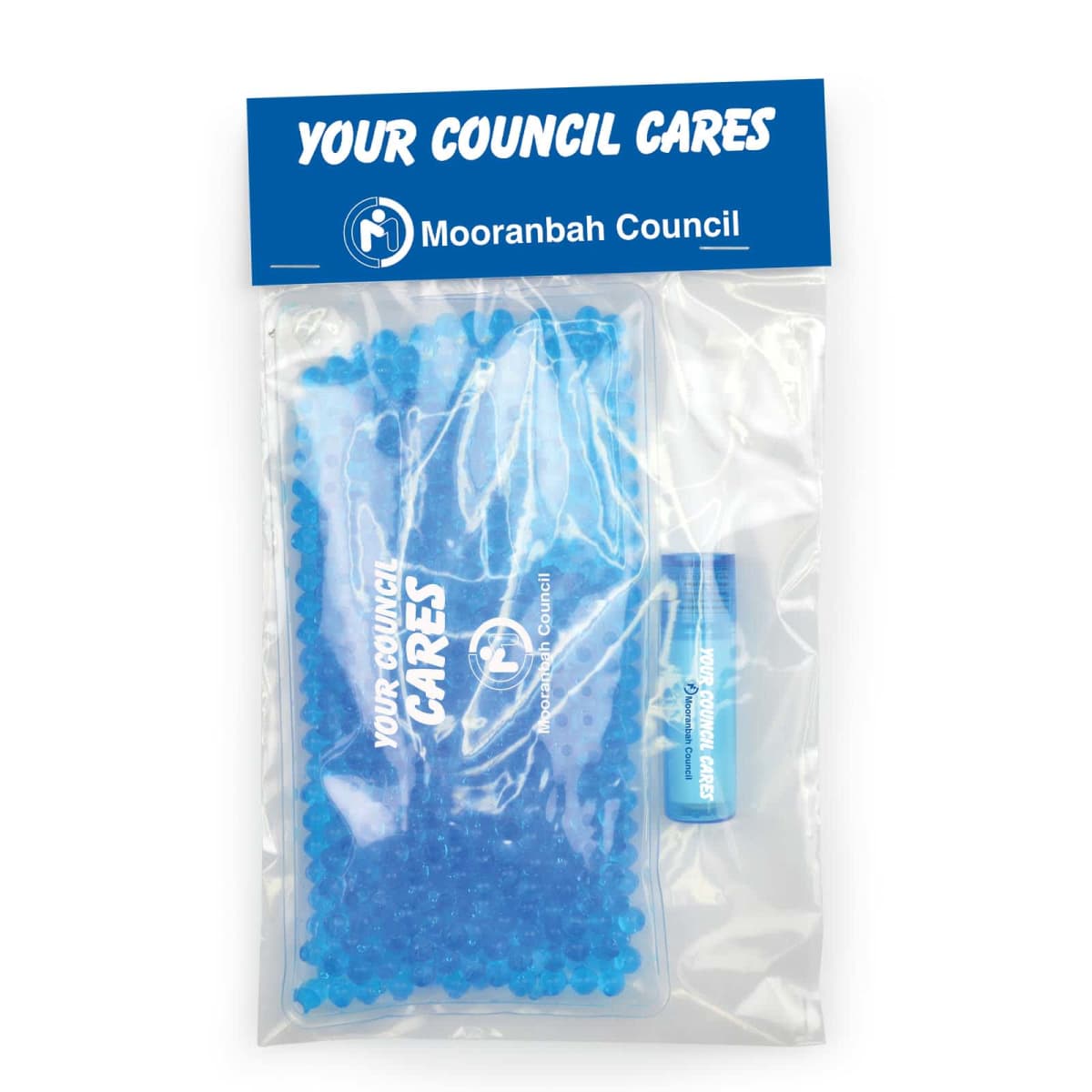 Clear plastic bag with blue lid labeled Your Council Cares and Mooranbah Council. Inside, there’s a blue gel bead eye mask and a lip balm.