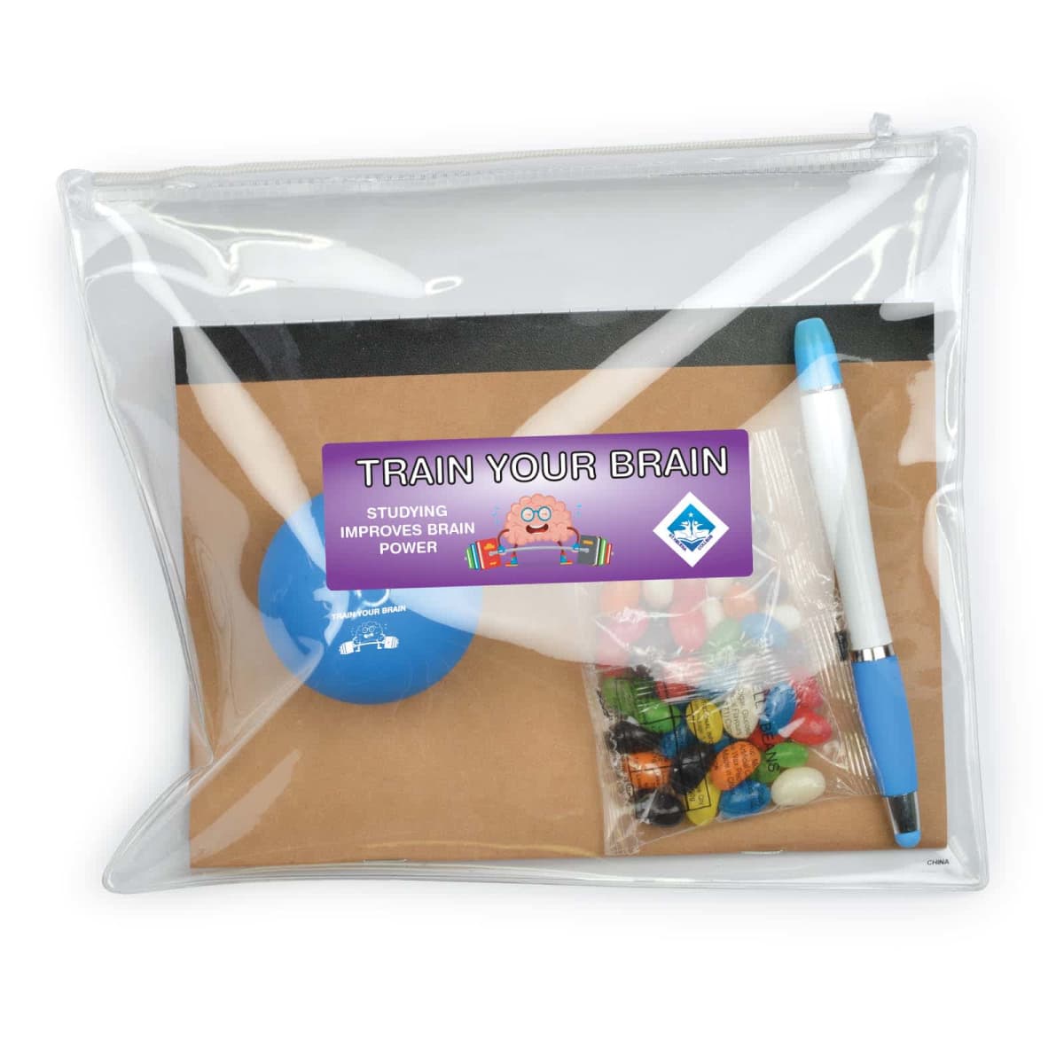 Transparent pouch containing a puzzle, pen, colorful candies, and a booklet. A label on the pouch reads, Train Your Brain: Studying Improves Brain Power, with a cartoon brain illustration.