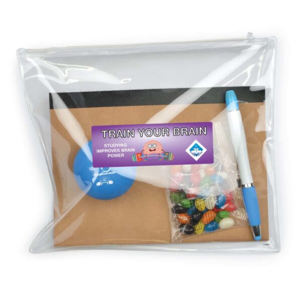Clear zippered pouch containing a stress ball, a pen, a small pack of jelly beans, and a notebook. The pouch has a label reading Train Your Brain: Studying Improves Brain Power with a cartoon character.