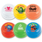 Collection of colorful yo-yos featuring various designs: logos of Rehabilitation Foundation and Viva Properties, and playful cartoon monsters labeled Sour Monster Jellies. Includes white, orange, red, green, blue, and orange yo-yos.