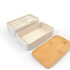 A three-piece bento lunchbox set on a white background. The set includes a bamboo lid, a rectangular container, and an inner compartment for holding a fork, knife, and spoon.