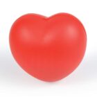 A smooth, red, heart-shaped object set against a plain white background.