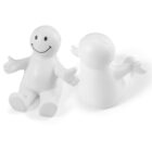 Two white, smiling figurines with open arms sit side by side. One is facing forward, displaying a happy face, while the other is turned away, showing its back. Both have simple, rounded features and a smooth, glossy finish.