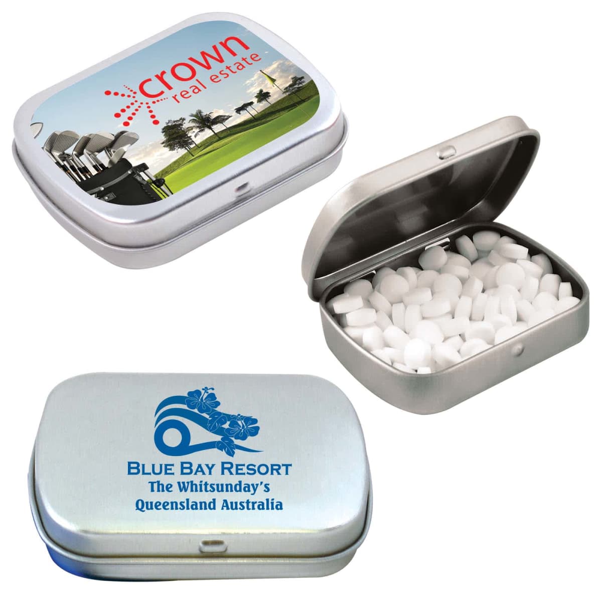 Three metal tins are shown: One with crown real estate and a seaside image, another open with white mints inside, and the third with Blue Bay Resort and floral graphics, labeled The Whitsundays, Queensland Australia.