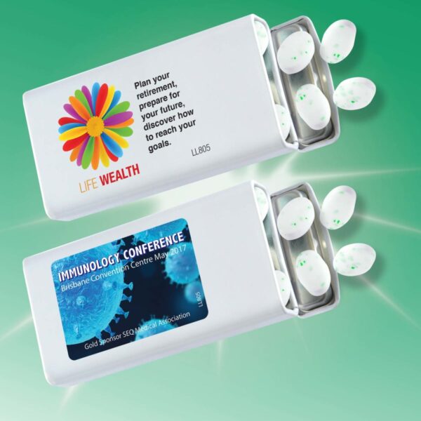 Two white mint tins, one labeled with Life Wealth and a colorful flower, the other with Immunology Conference, Brisbane Convention Centre May 2017. Both tins are open, showing white mints inside against a green background.