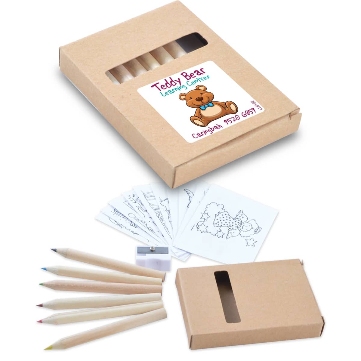 A cardboard box labeled Teddy Bear Learning Centre contains a set of coloring tools. It includes six colored pencils, a sharpener, and several illustrated coloring sheets with images of flowers and animals. The box has a cut-out window.