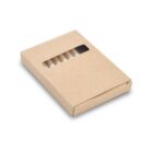 A small, flat cardboard box with a transparent window revealing the tips of wooden sticks inside, likely matches or toothpicks. The packaging is simple and unadorned.