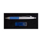A blue and silver ballpoint pen with a dotted grip lies parallel to a closed blue and black USB flash drive on a black background.