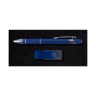 A blue ballpoint pen with a silver clip is placed above a blue USB flash drive on a black textured surface.
