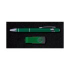 A green pen with silver accents and a green USB flash drive with a swivel cover are placed on a black surface.