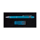 A blue pen with silver accents and a clip placed above a matching blue USB flash drive with a swivel cover, both on a black textured surface.