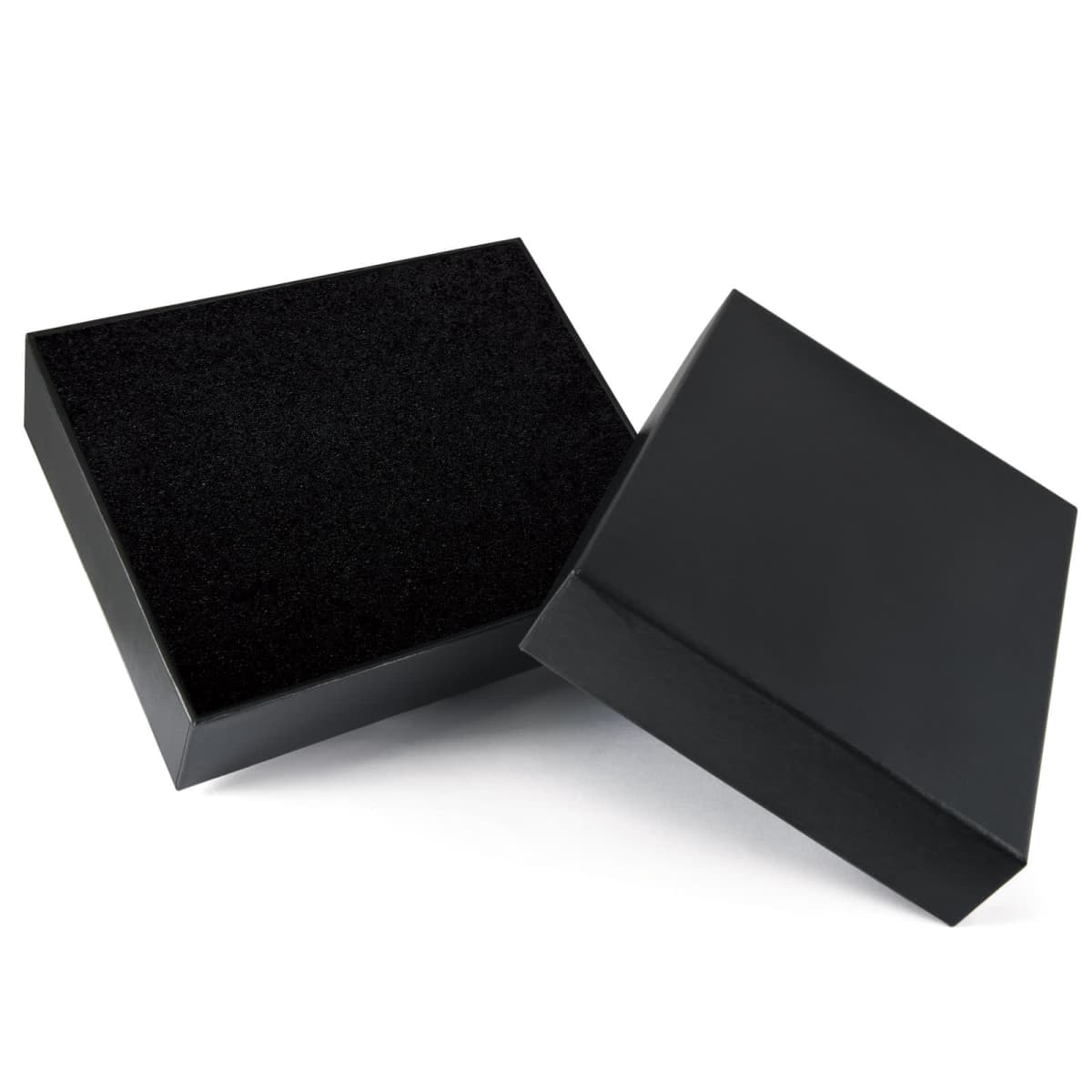A black rectangular box with its lid partially open, revealing an empty interior. The box is positioned on a white surface with a slight shadow.