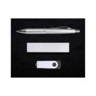 A silver pen, a closed silver rectangular box, and a white USB drive with a black circle, all neatly arranged on a black background.