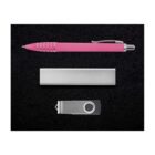 A pink click pen, a rectangular silver case, and a silver and black USB flash drive are arranged on a black background.