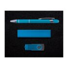 A blue pen, a blue rectangular object, and a black and blue USB drive are arranged neatly on a black textured background.