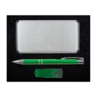 A sleek silver rectangular power bank, a green ballpoint pen with metal accents, and a green USB flash drive with a swivel cover are placed neatly against a black background.