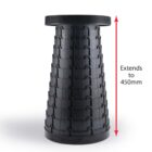 A collapsible telescopic stool in black, shown extended. The stool has a circular seat and a pattern of interlocking segments. A red arrow and text indicate it extends to 450mm.
