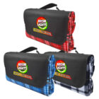 Three folded picnic blankets with black flaps, featuring red, blue, and black plaid designs. Each flap displays the Neon Lights Music Festival logo in vibrant colors.