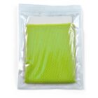 A bright green mesh fabric item is sealed in a clear plastic bag. The bag is labeled as being intended for RED on the top left. A white label is partially visible behind the fabric through the packaging.