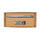 A cardboard box containing a silver ballpoint pen and a silver USB flash drive laid inside. The pen has a shiny finish and the USB drive has a swivel cover. The box is simple and unadorned.