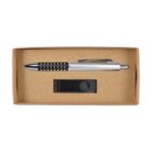 A cardboard box containing a silver and black ballpoint pen with a dotted grip, alongside a black USB flash drive with a swivel cover.