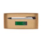 A cardboard box containing a silver and black pen and a green and black USB flash drive. The pen is positioned above the flash drive inside the box.