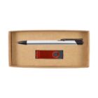 A cardboard box contains a silver and black pen alongside a red and black USB flash drive. The items are neatly placed within the box.
