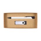 A black and white pen and a USB flash drive with a loop design are neatly placed inside an open rectangular cardboard box. The interior of the box is a natural brown color.